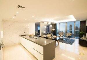 The Sterling by OMNIYAT Kitchen with Living